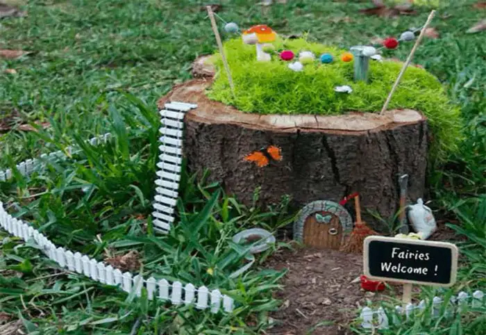 Amazing 26+ tree stump design ideas for your garden
